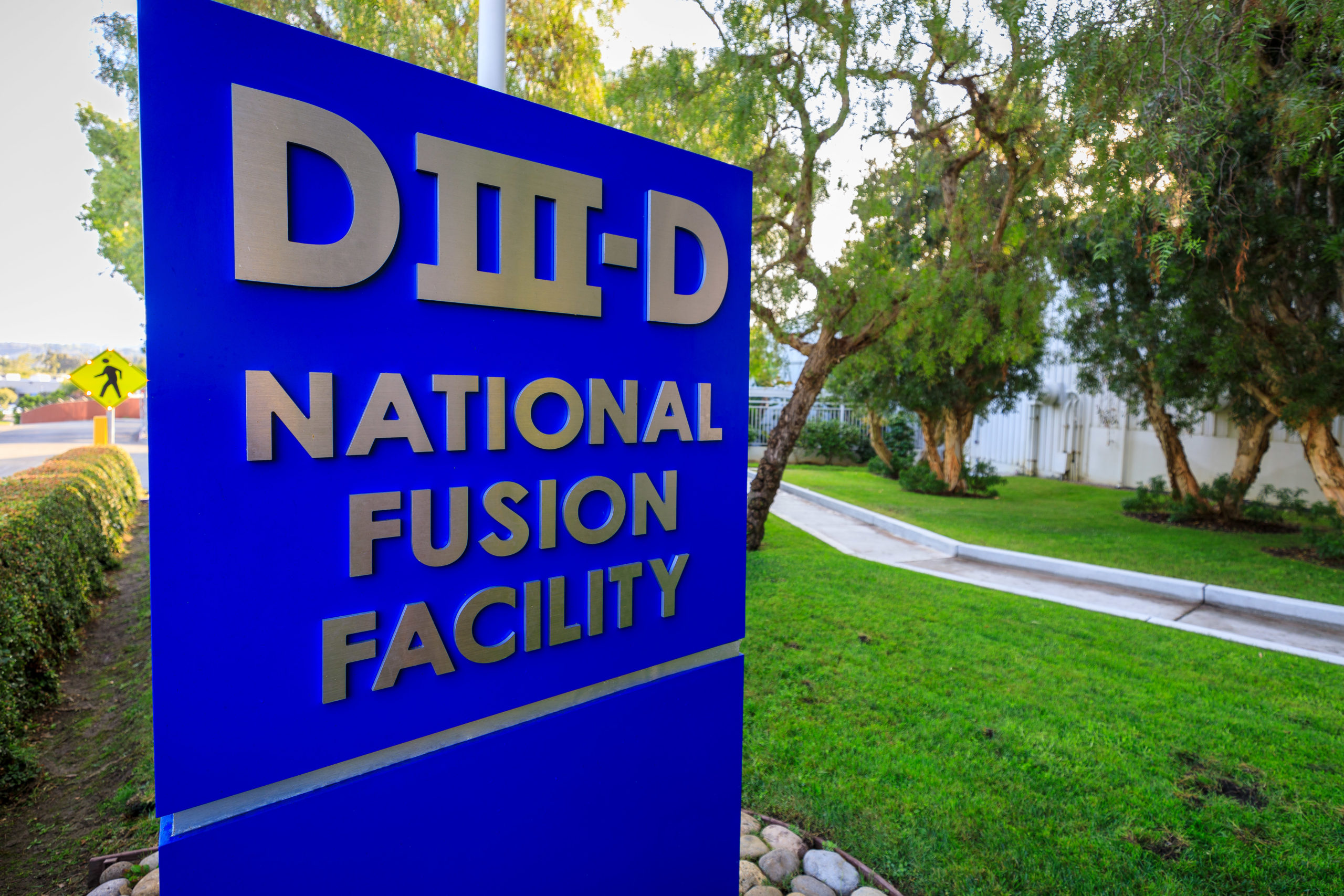 Blue sign reading "DIII-D National Fusion Facility"