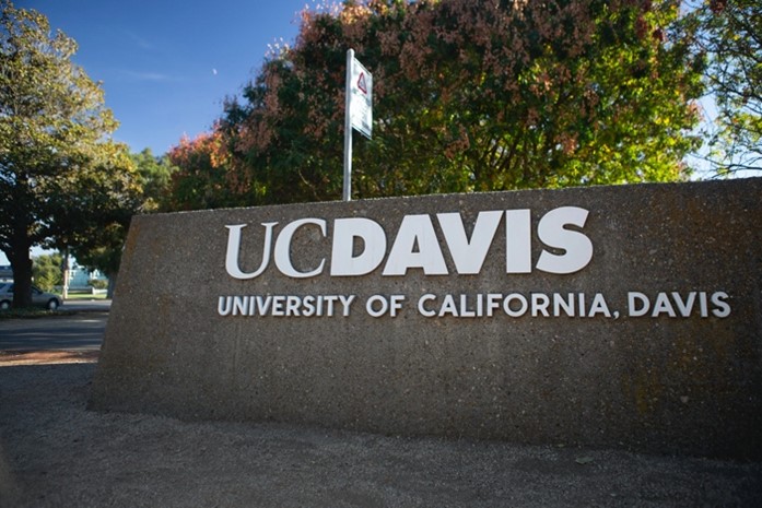 A wall reads: UC Davis, University of California, Davis